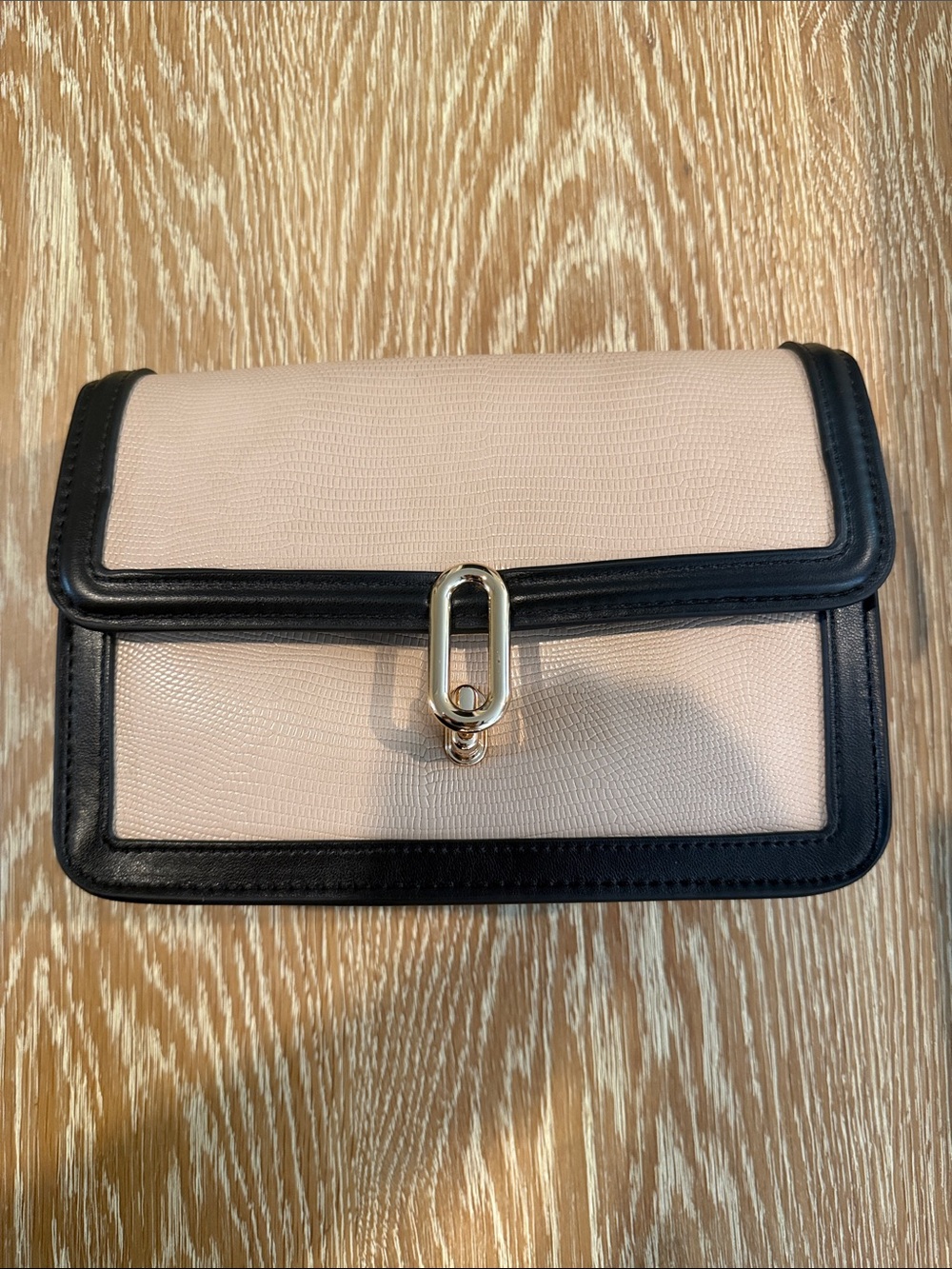 Two-Tone Blush and Black Wristlet Clutch with Gold Hardware